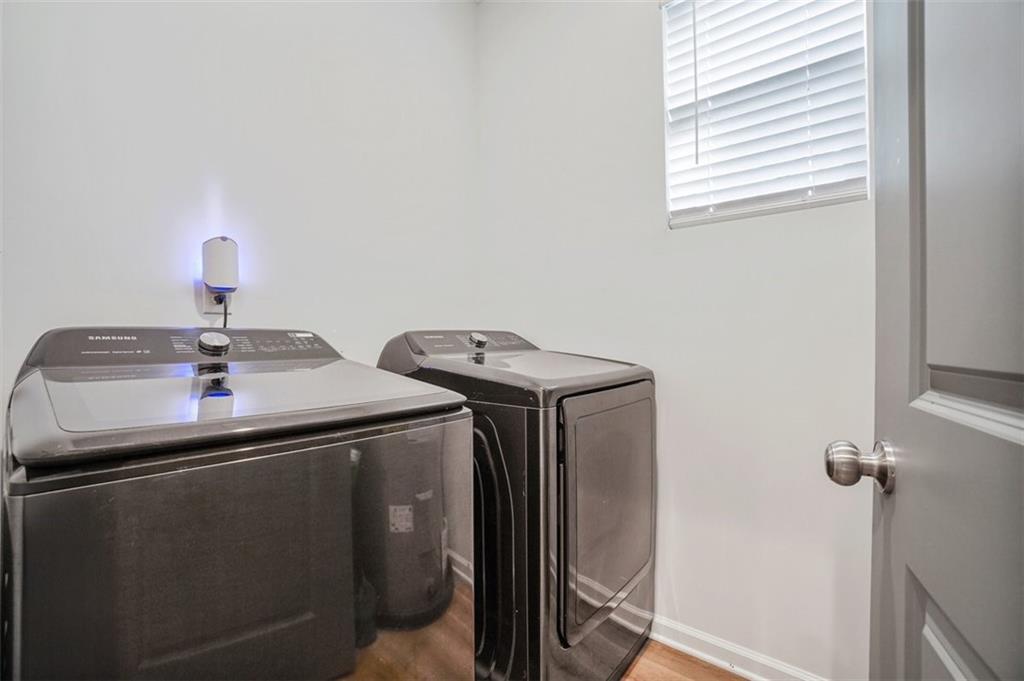 3510 Thompson Drive Northwest Atlanta, GA 30331 - Photo 22 of 28 a utility room with dryer and washer