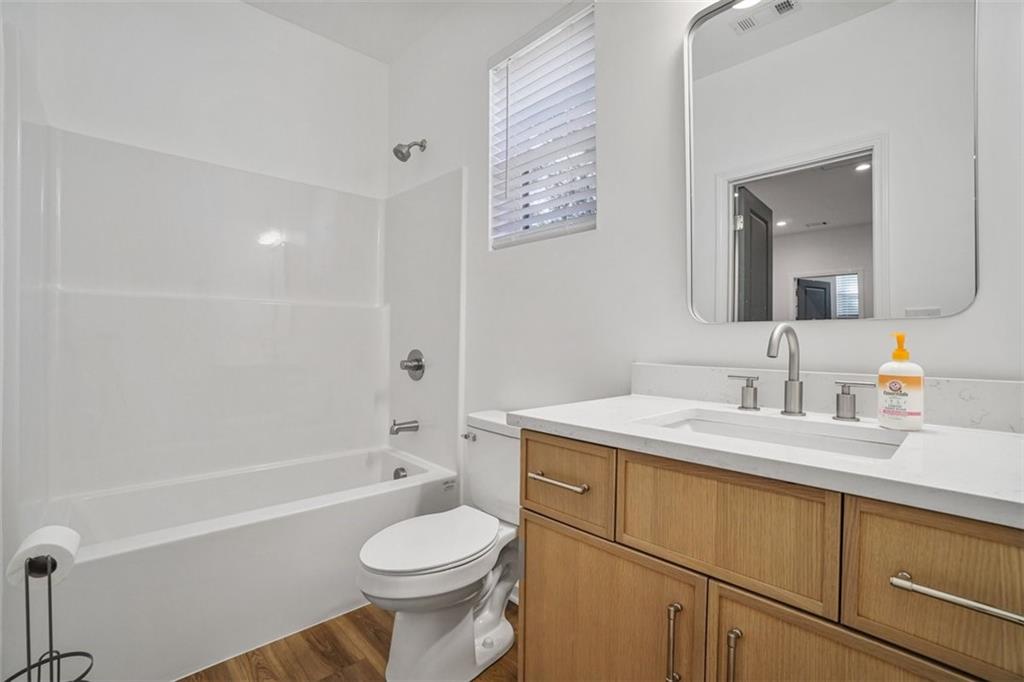 3510 Thompson Drive Northwest Atlanta, GA 30331 - Photo 23 of 28 a bathroom with a sink a toilet and shower