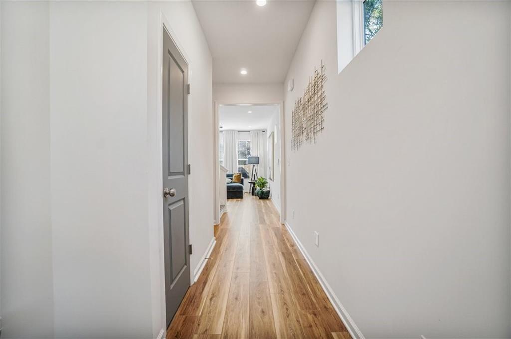 3510 Thompson Drive Northwest Atlanta, GA 30331 - Photo 5 of 28 a view of a hallway with wooden floor and staircase