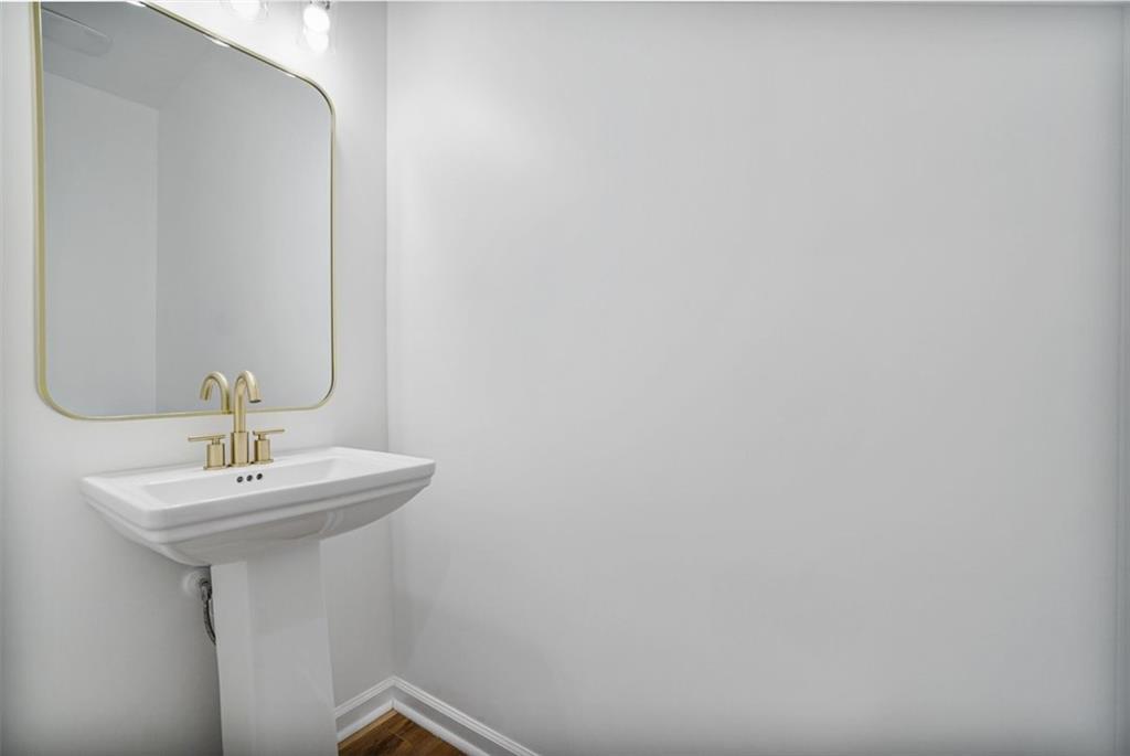 3510 Thompson Drive Northwest Atlanta, GA 30331 - Photo 6 of 28 a bathroom with a sink and a mirror
