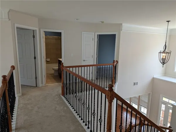 a view of a hallway with entryway