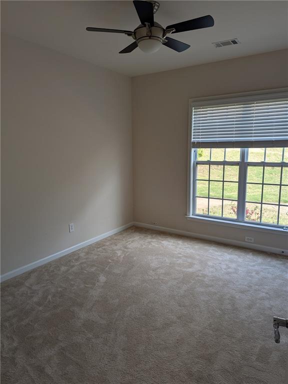 430 Floral Place Suwanee, GA 30024 - Photo 19 of 26 an empty room with a window
