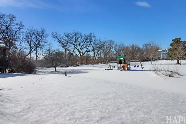 a view of snow on the road