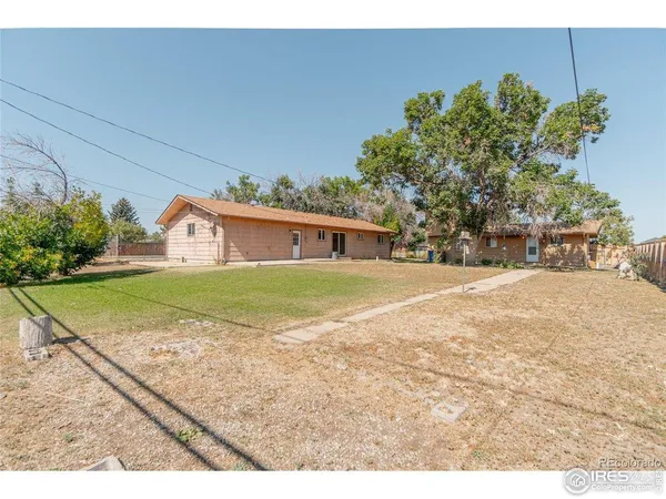 a upper view of a house with a yard