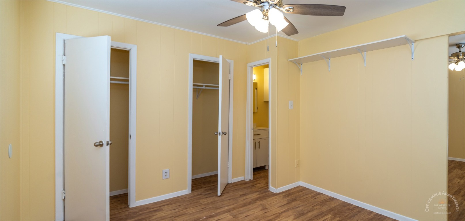 2108 San Gabriel Street, Unit 201 Austin, TX 78705 - Photo 9 of 15 a view of an empty room with wooden floor