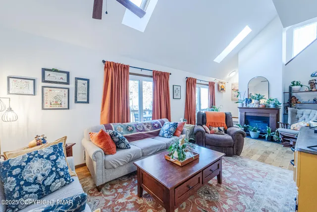 a living room with furniture and a couch