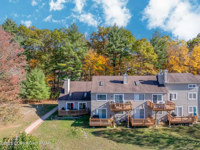 a aerial view of a house with garden