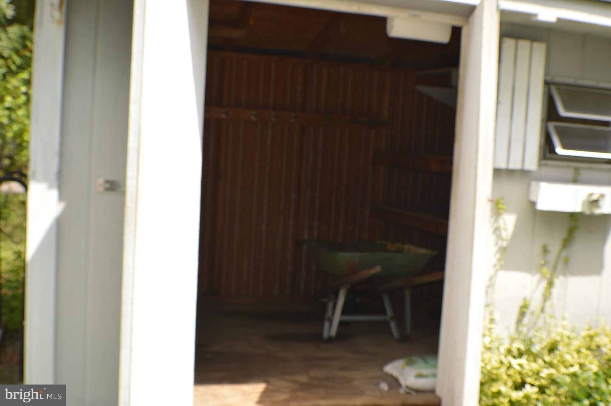 286 Riverside Drive Pasadena, MD 21122 - Photo 55 of 66 front storage shed