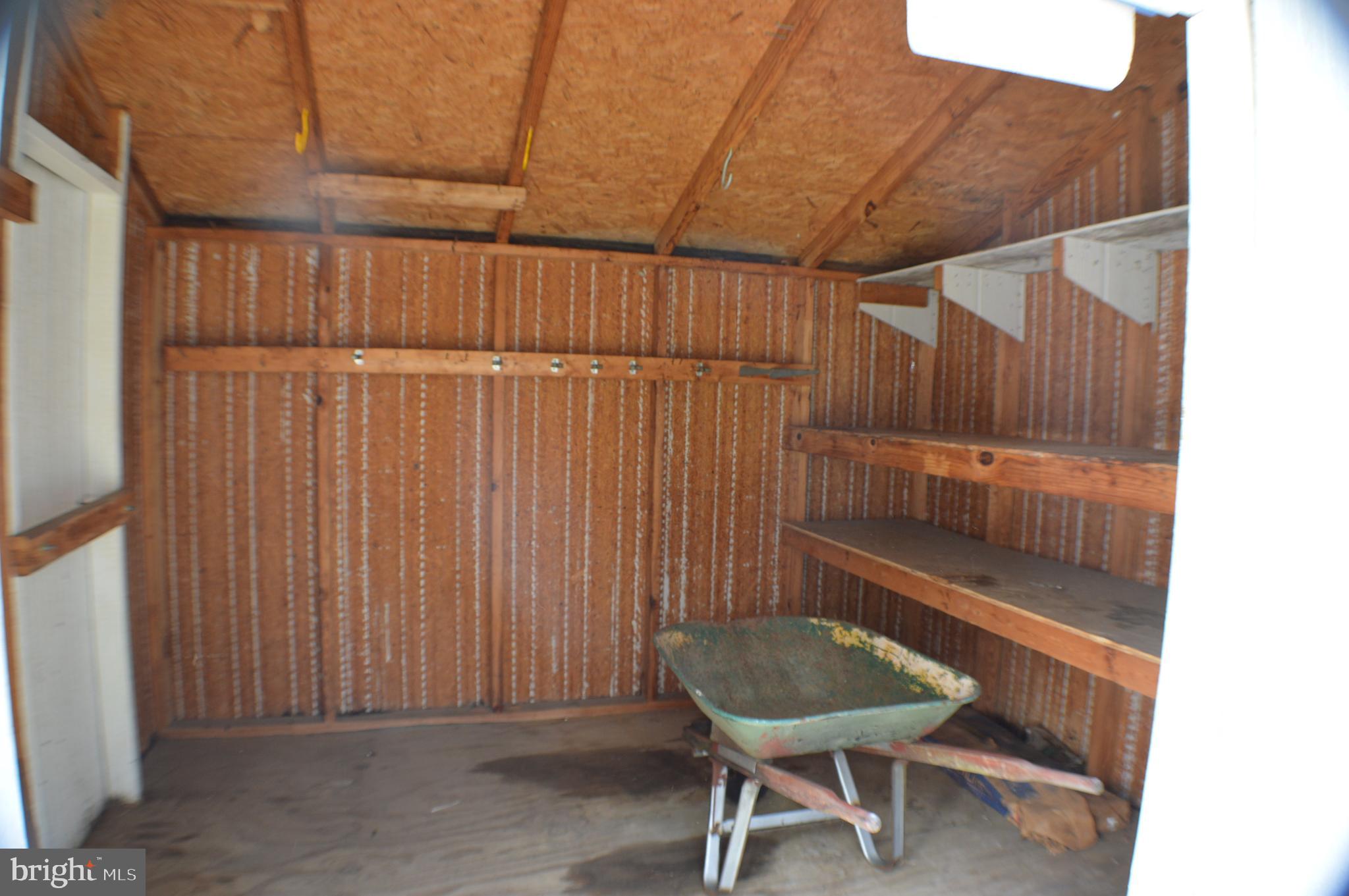 286 Riverside Drive Pasadena, MD 21122 - Photo 56 of 66 interior front storage shed