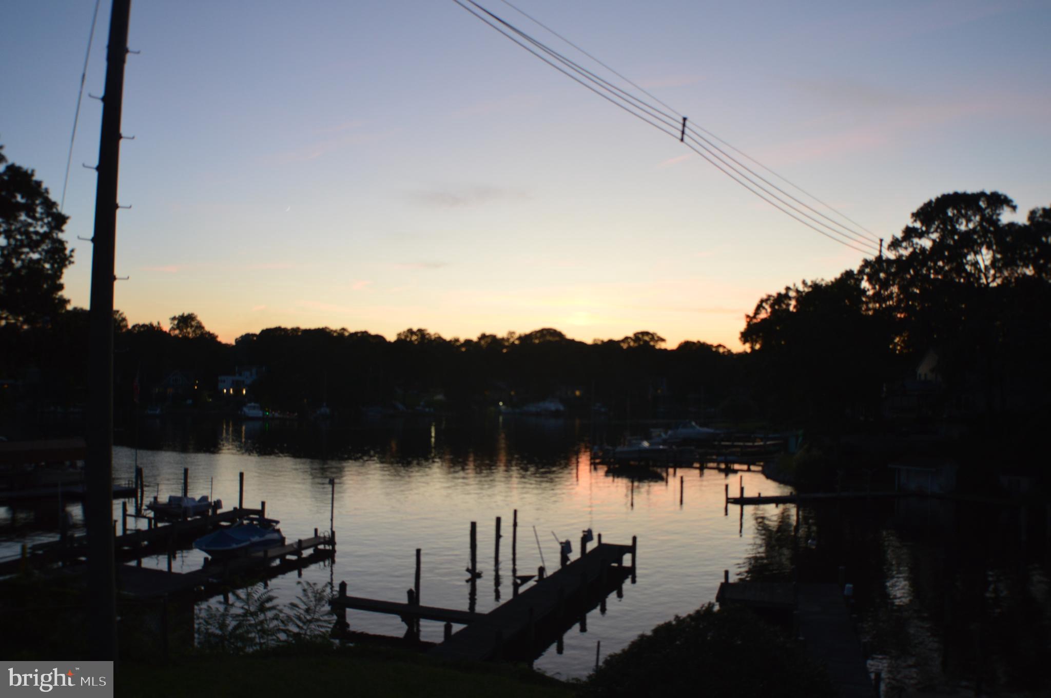 286 Riverside Drive Pasadena, MD 21122 - Photo 66 of 66 Twighlight view of sunset from 1st floor deck.....