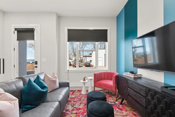 a living room with furniture and a window