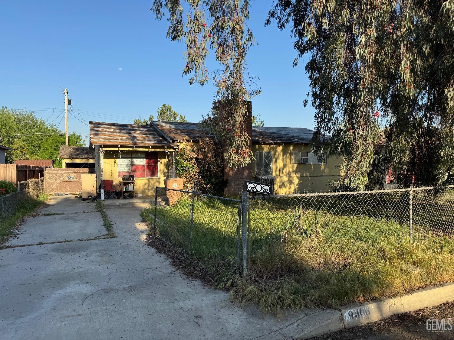 Undisclosed Address Bakersfield, CA 93307 - Photo 2 of 3 a view of swimming pool with a patio
