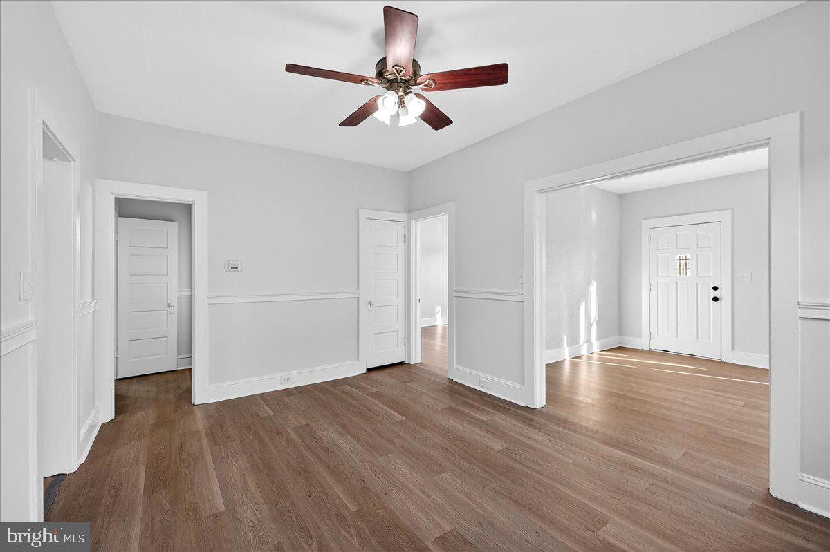 615 13th Street New Castle, DE 19720 - Photo 9 of 39 a view of an empty room with wooden floor