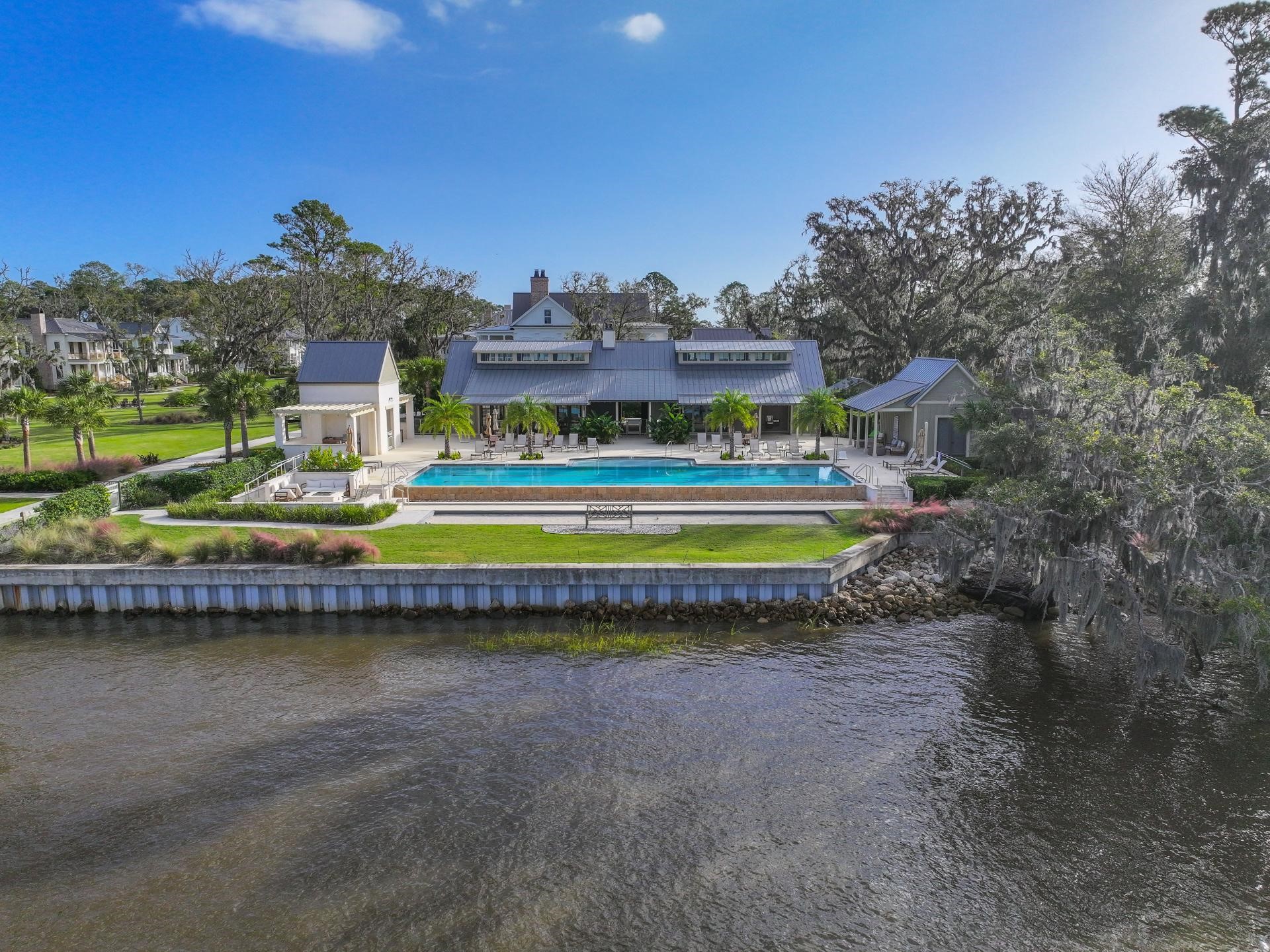 73 Broadbent Way Fernandina Beach, FL 32034 - Photo 16 of 21 a view of swimming pool with a yard and plants