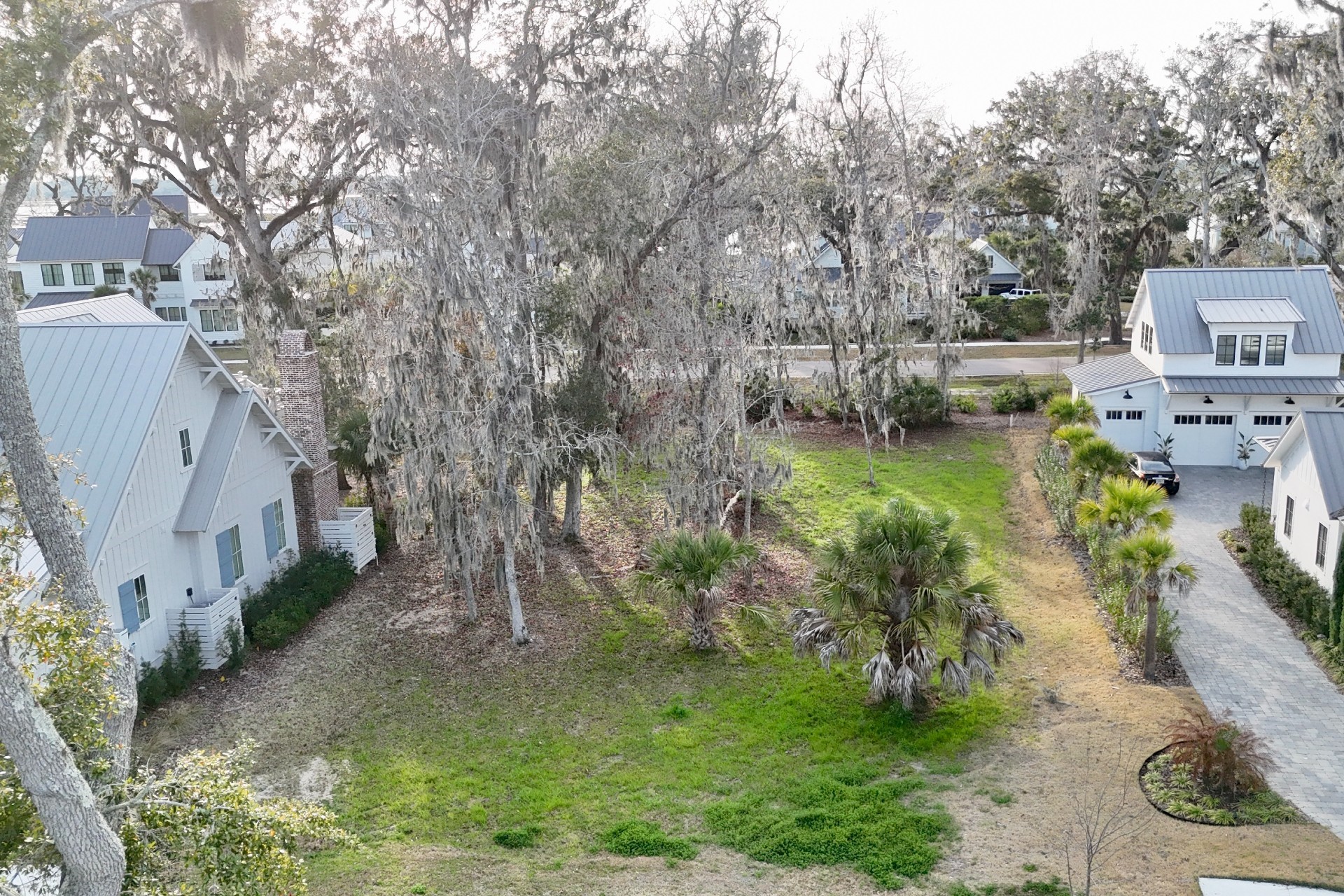 73 Broadbent Way Fernandina Beach, FL 32034 - Photo 5 of 21 a backyard of a house with lots of green space