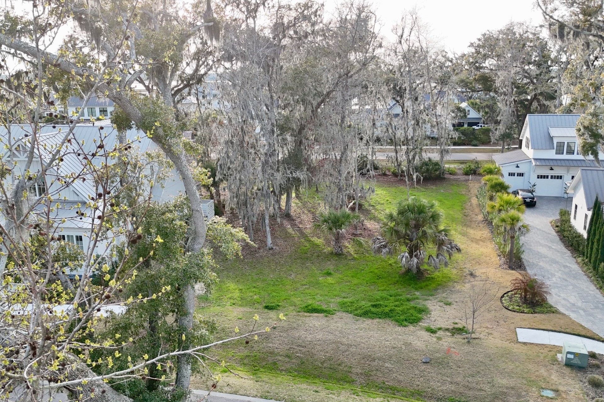 73 Broadbent Way Fernandina Beach, FL 32034 - Photo 8 of 21 a backyard of a house with a yard and outdoor seating
