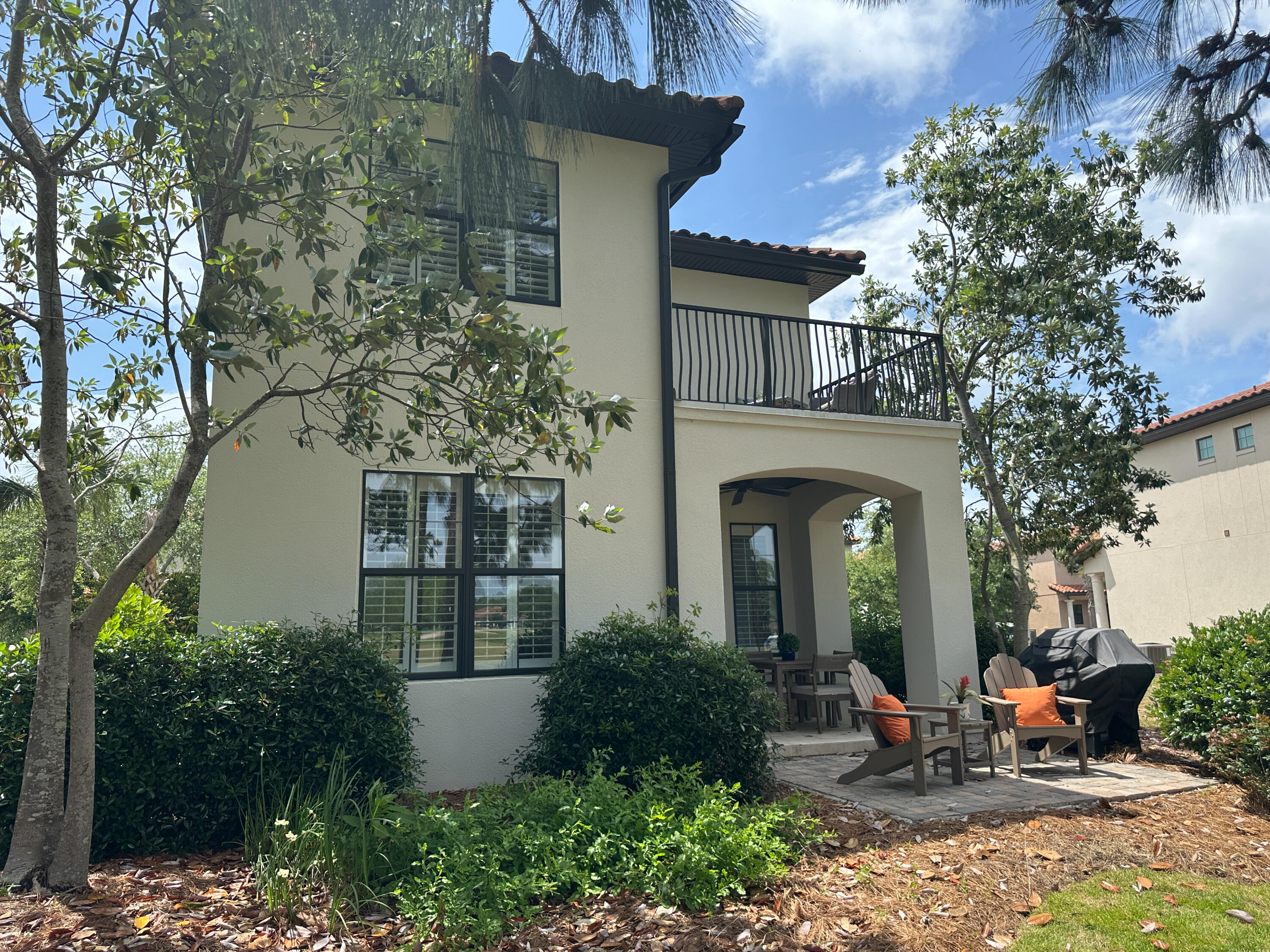 1893 Baytowne Loop Miramar Beach, FL 32550 - Photo 11 of 58 a front view of house with yard and green space