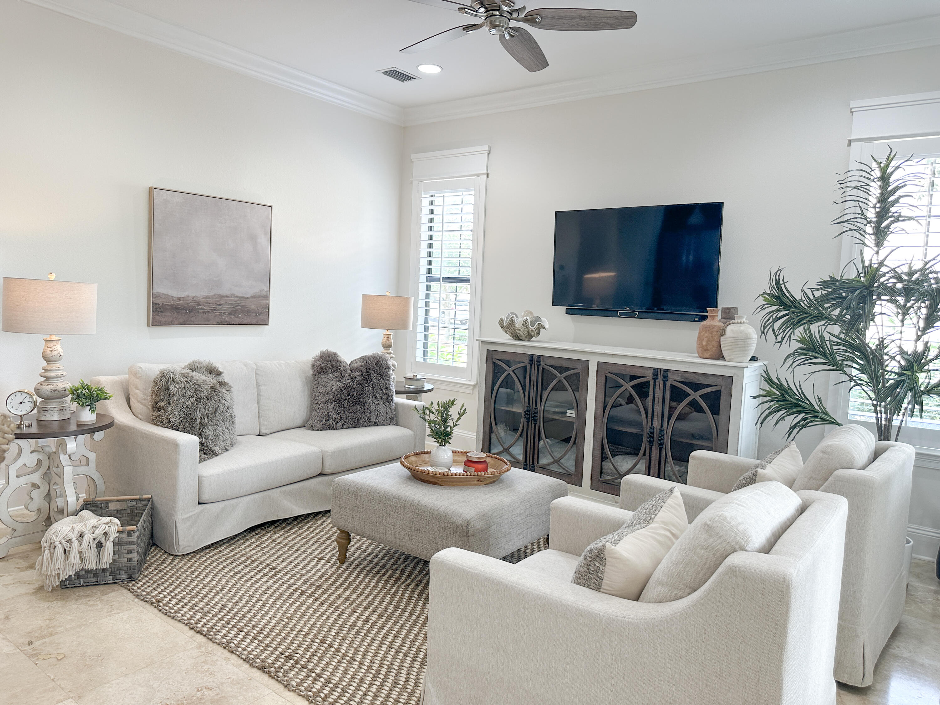 1893 Baytowne Loop Miramar Beach, FL 32550 - Photo 18 of 58 a living room with furniture a flat screen tv and a large window
