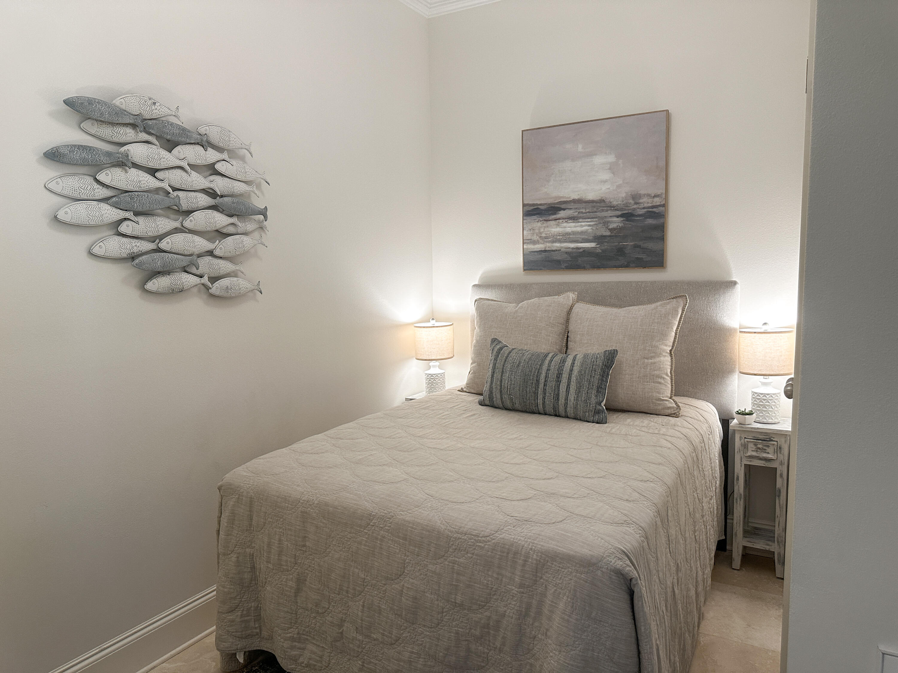 1893 Baytowne Loop Miramar Beach, FL 32550 - Photo 26 of 58 a bedroom with a bed and a painting on the wall