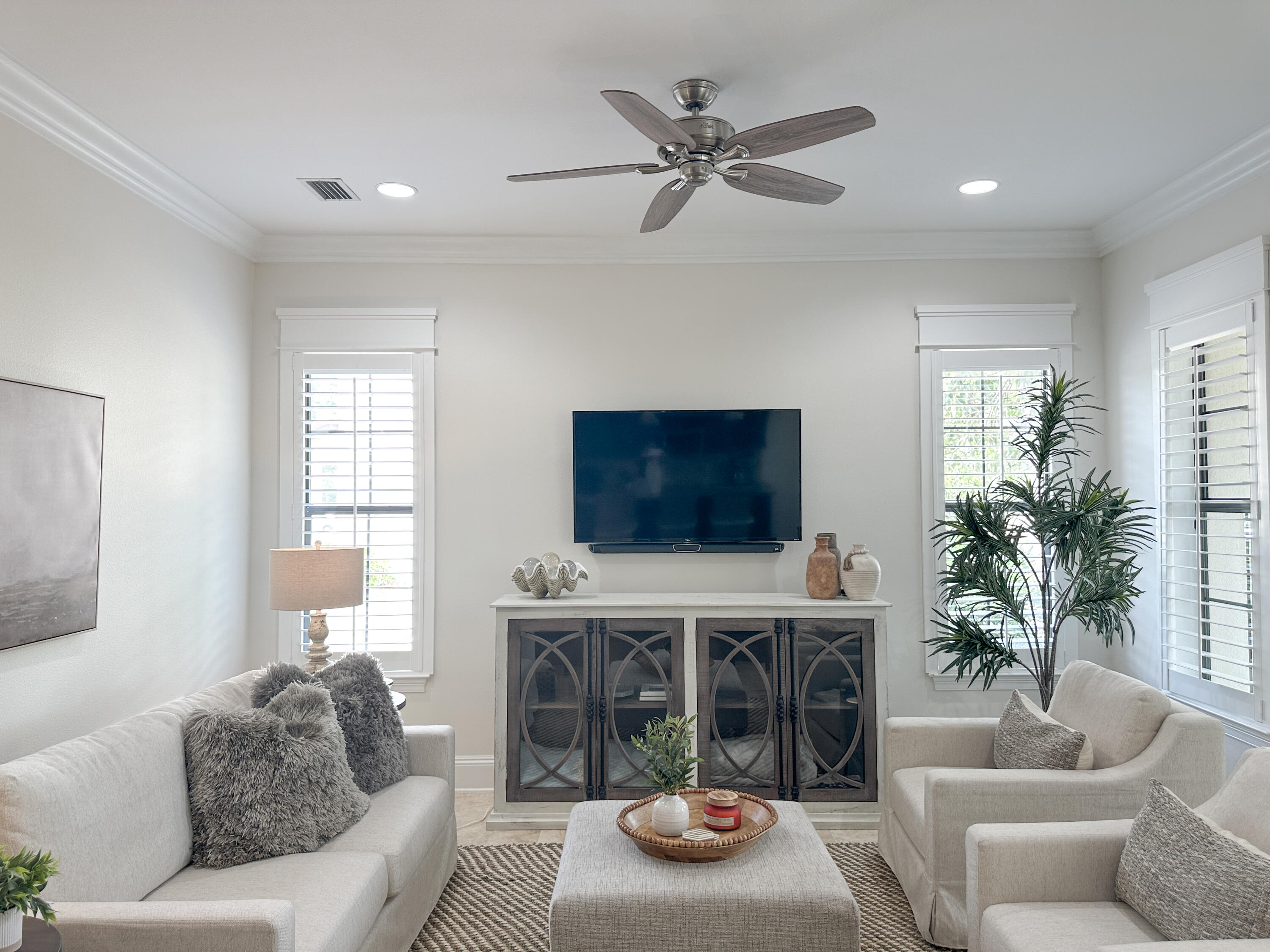 1893 Baytowne Loop Miramar Beach, FL 32550 - Photo 4 of 58 a living room with furniture a fireplace and a flat screen tv