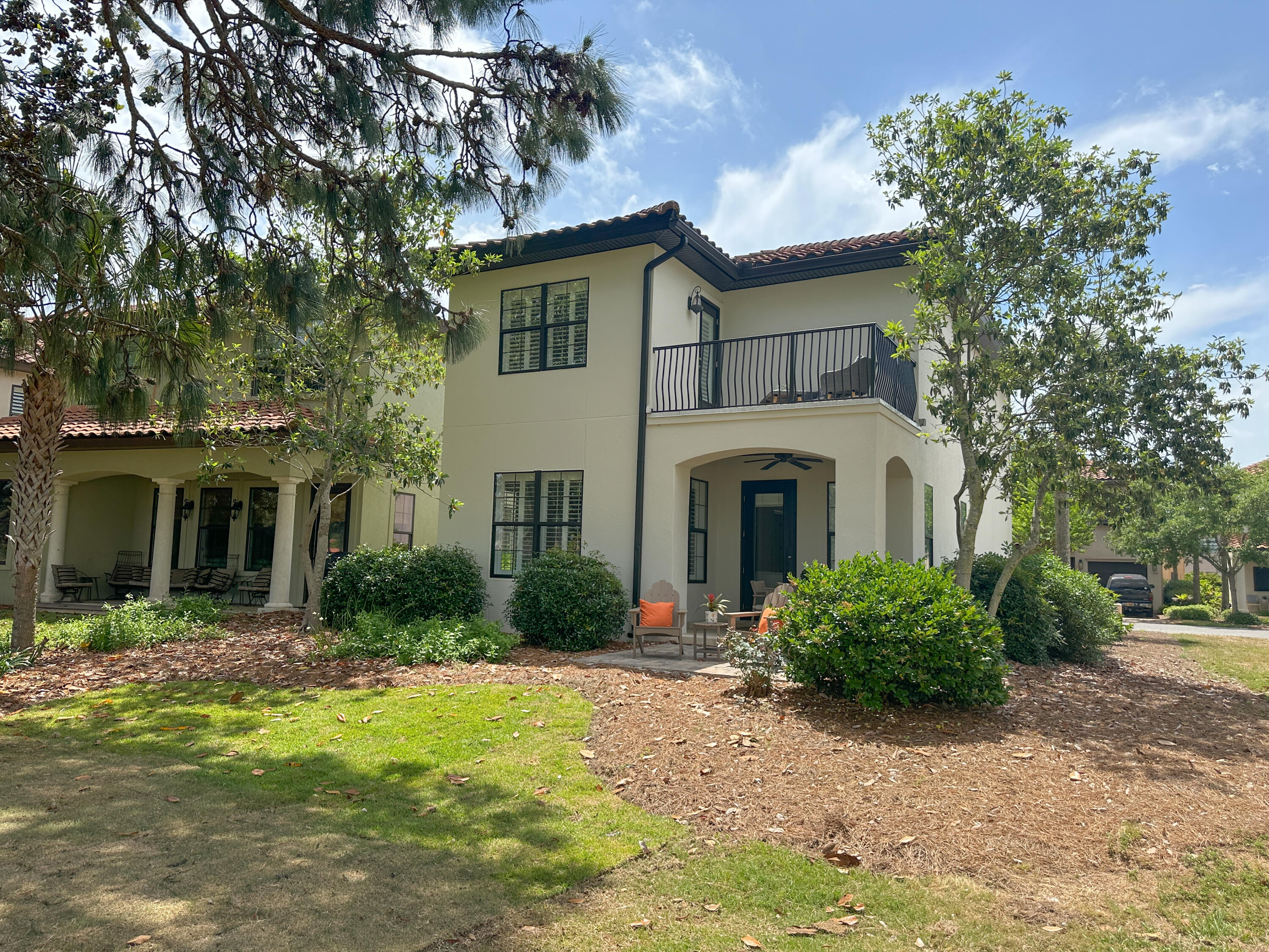 1893 Baytowne Loop Miramar Beach, FL 32550 - Photo 49 of 58 a front view of a house with garden