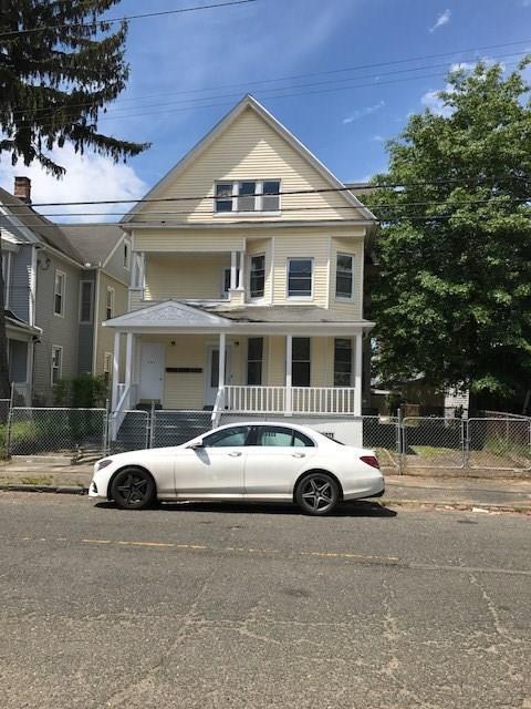 201 Bunnell Street Bridgeport, CT 06607 - Photo 1 of 1 a car parked in front of a house
