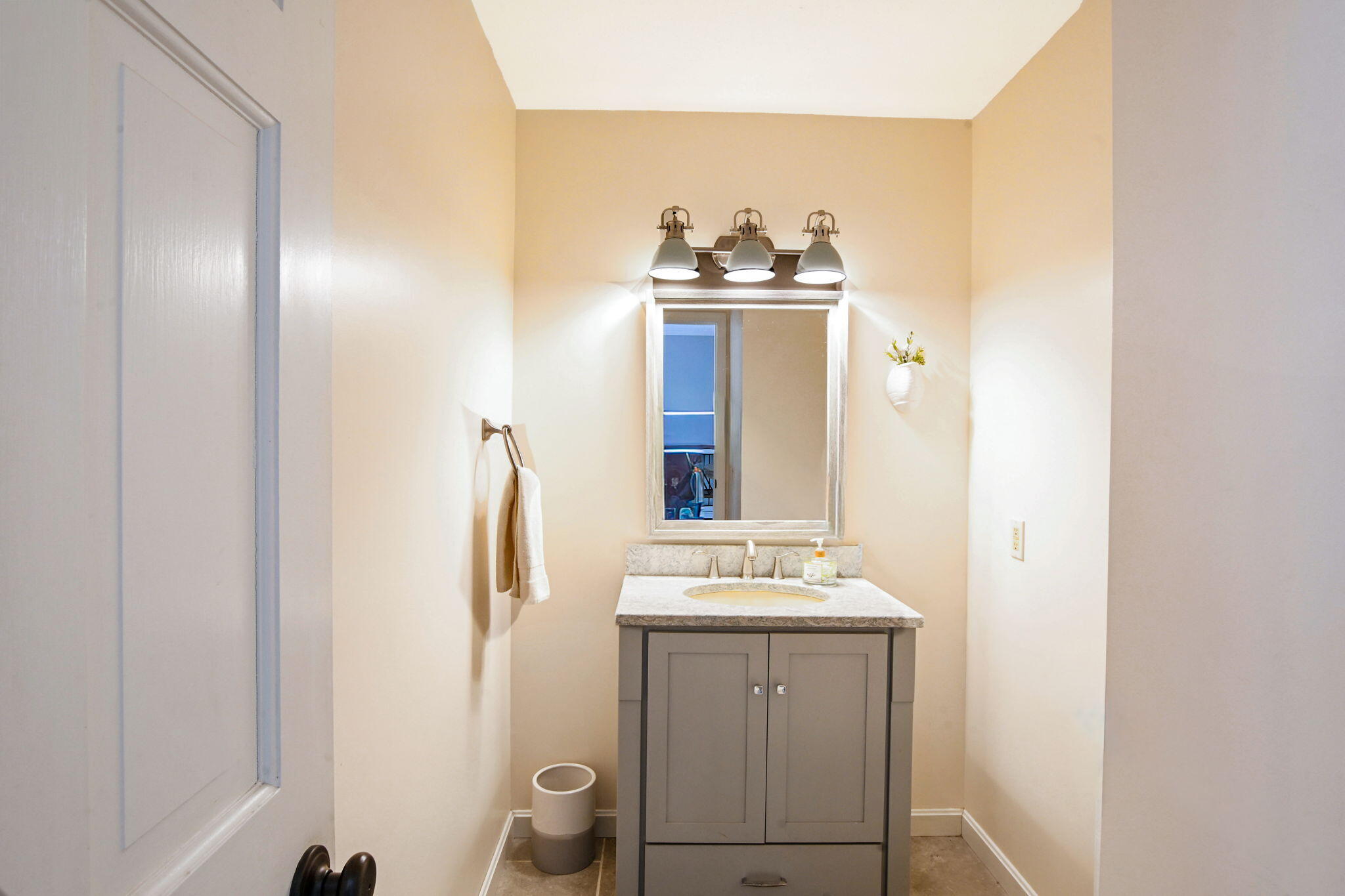 59 Main Street, Unit 20-3 Dennis, MA 02638 - Photo 14 of 40 a bathroom with a sink and mirror