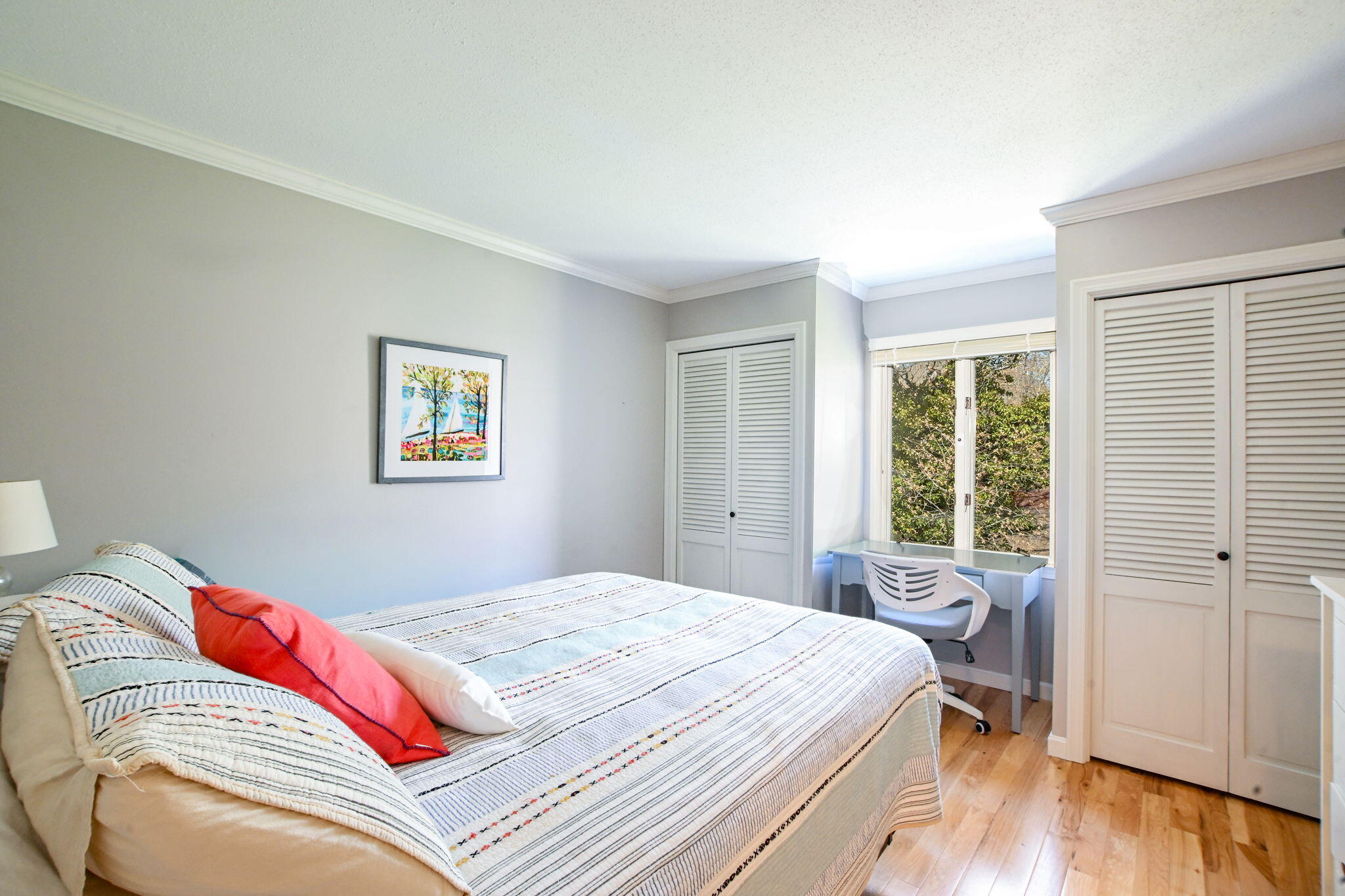 59 Main Street, Unit 20-3 Dennis, MA 02638 - Photo 19 of 40 a bedroom with a bed and a window