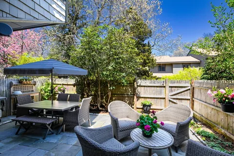 a view of outdoor space with swimming pool and trees