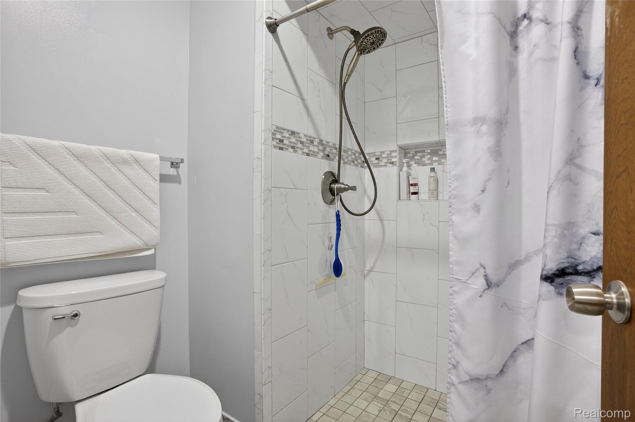 1715 River Road, Unit 77 St. Clair, MI 48079 - Photo 41 of 59 Full bath with a stall shower and toilet