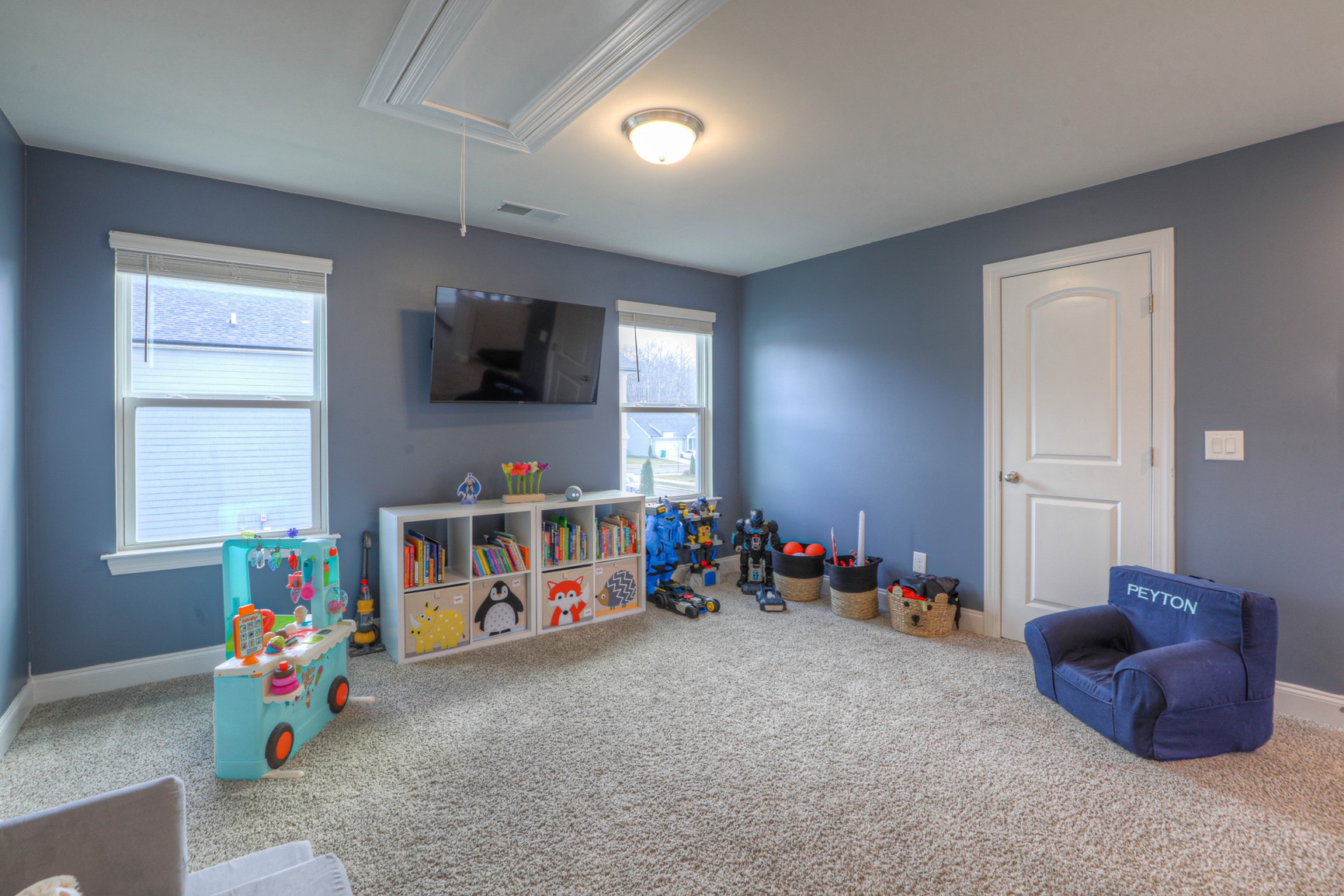 2072 Notchleaf Road Antioch, TN 37013 - Photo 11 of 30 a living room with furniture and a flat screen tv