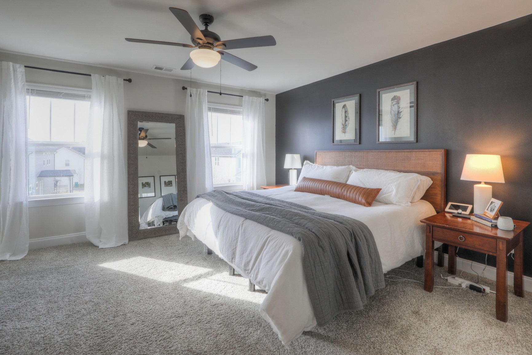 2072 Notchleaf Road Antioch, TN 37013 - Photo 14 of 30 a bedroom with a bed and a chandelier