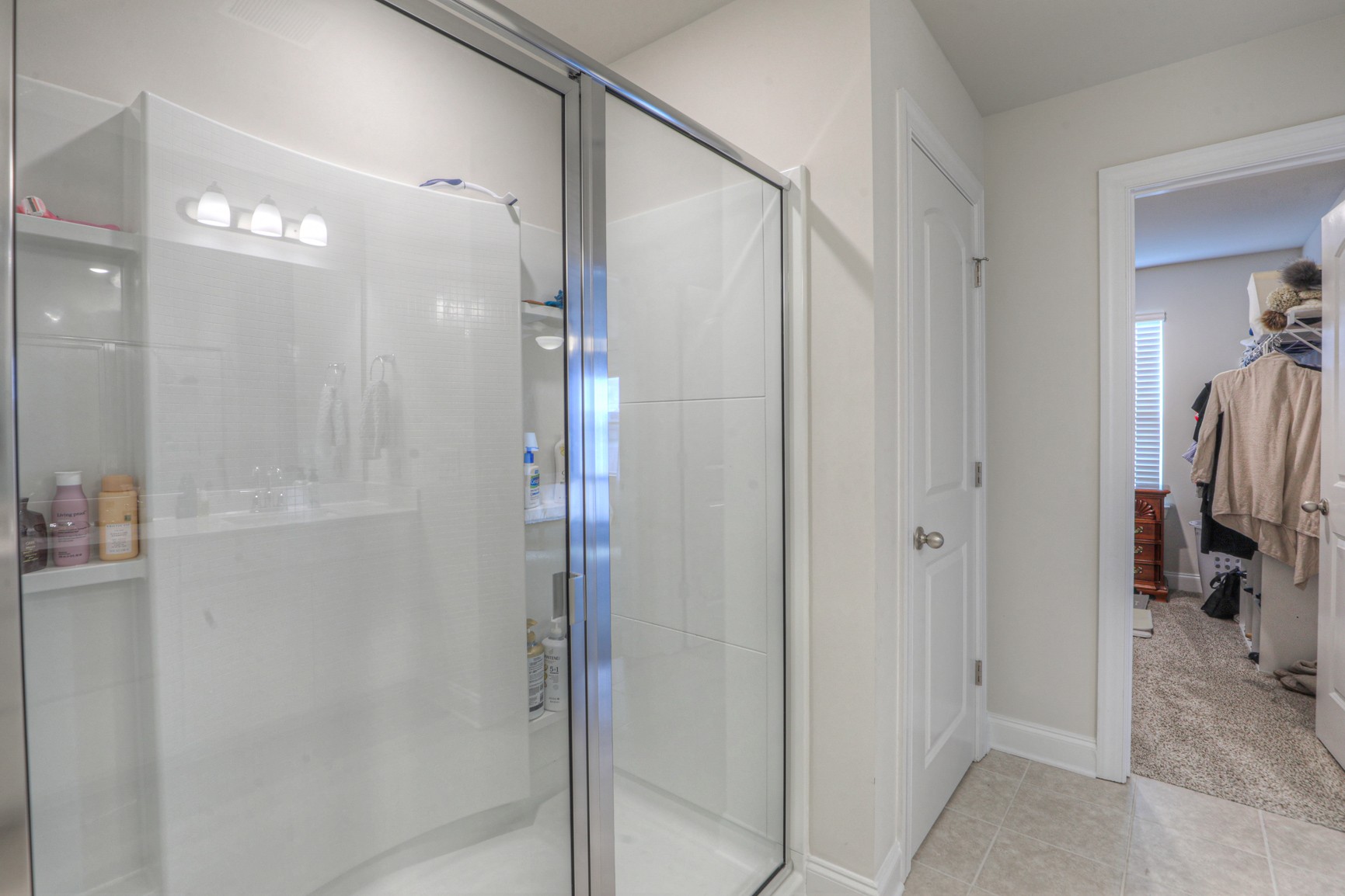 2072 Notchleaf Road Antioch, TN 37013 - Photo 16 of 30 a bathroom with a shower and a mirror