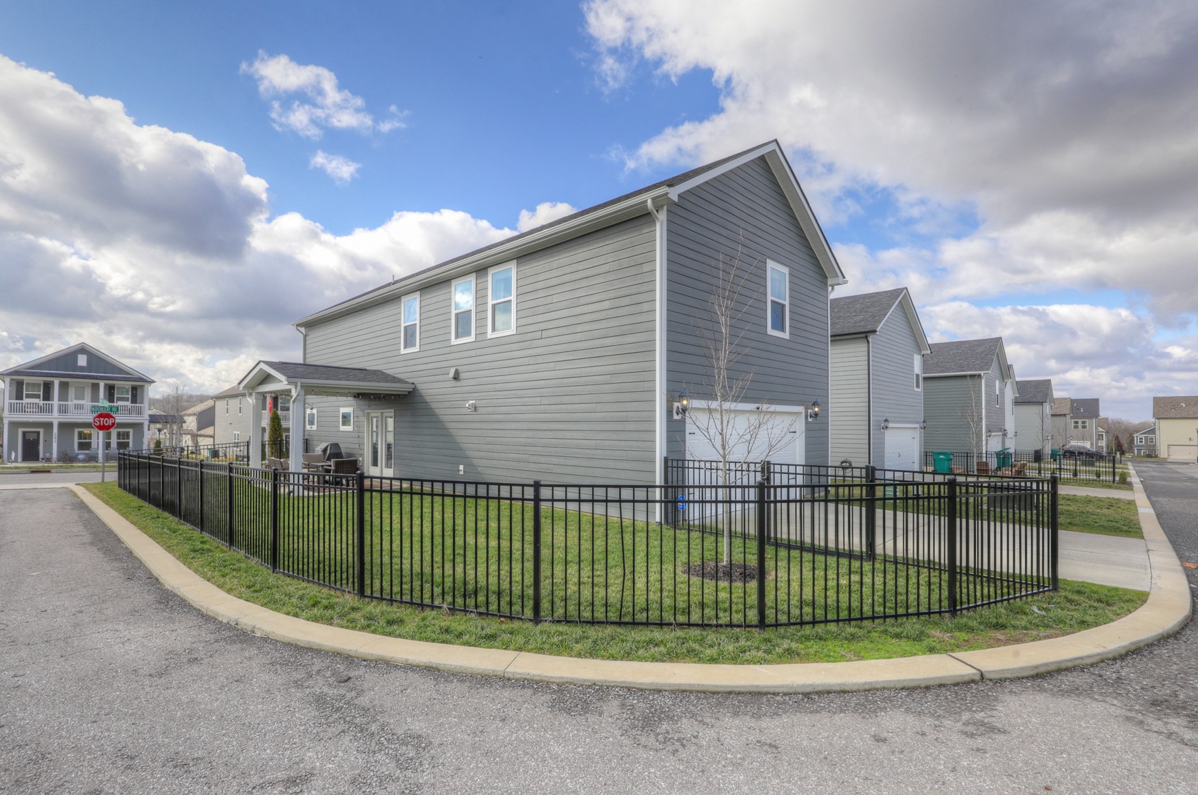 2072 Notchleaf Road Antioch, TN 37013 - Photo 27 of 30 a view of a white house in front of a yard