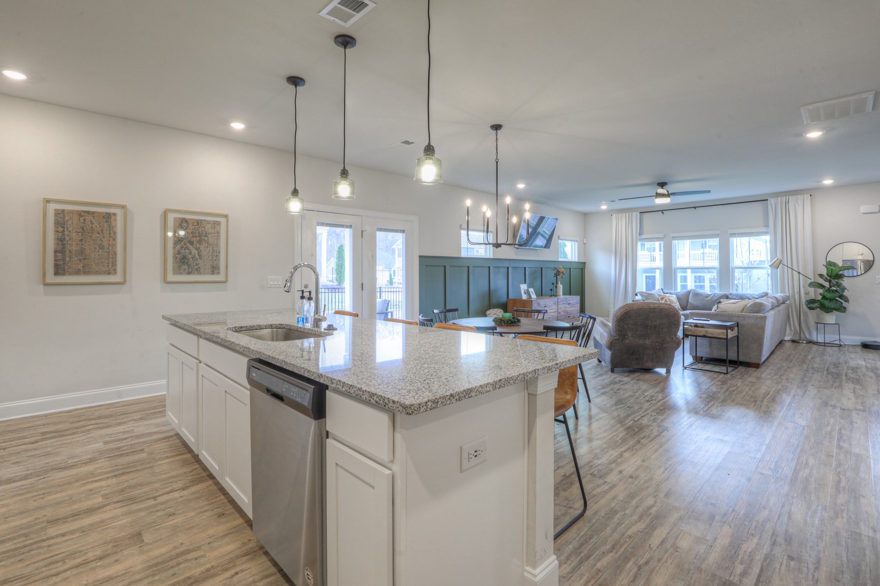 2072 Notchleaf Road Antioch, TN 37013 - Photo 8 of 30 a kitchen with stainless steel appliances granite countertop wooden floors and a view of living room