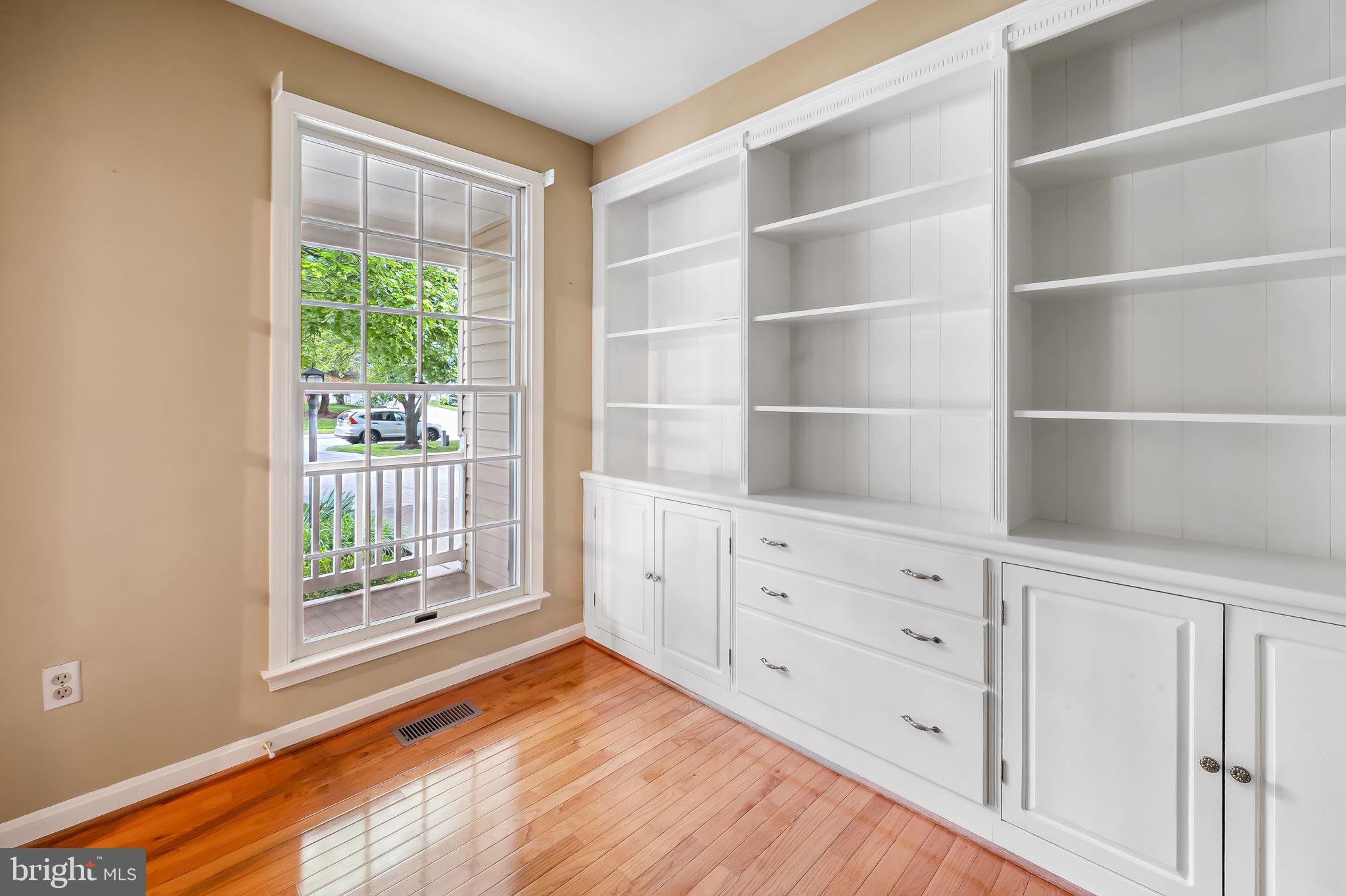 6902 Raven Lane Columbia, MD 21044 - Photo 11 of 47 a view of an empty room with a window