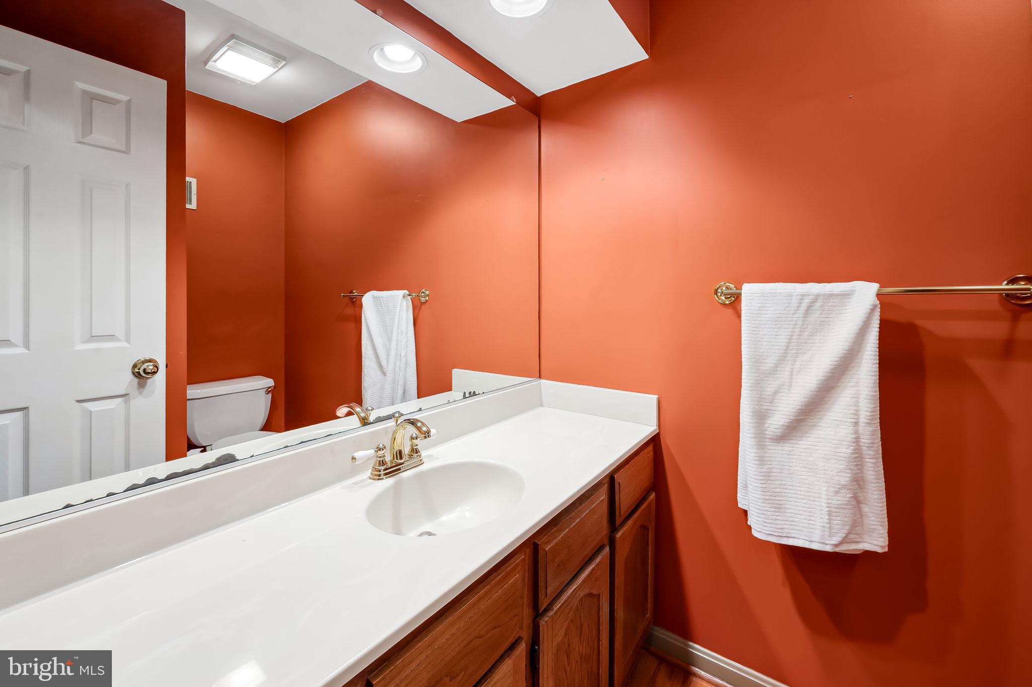6902 Raven Lane Columbia, MD 21044 - Photo 12 of 47 a bathroom with a sink and a mirror