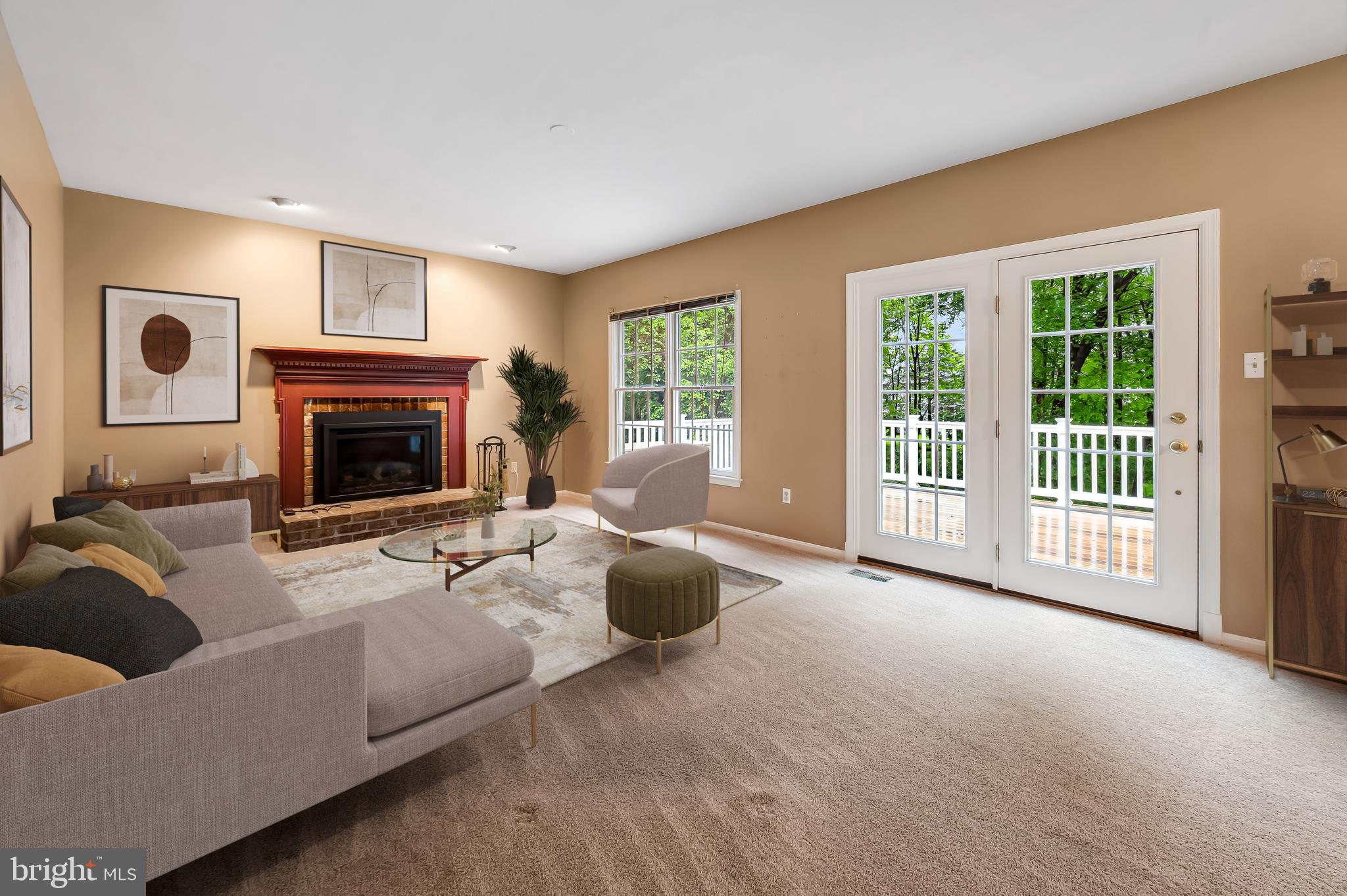 6902 Raven Lane Columbia, MD 21044 - Photo 17 of 47 a living room with furniture and a fireplace