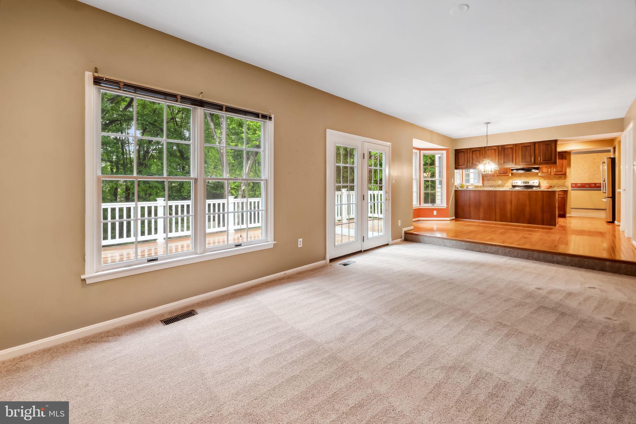 6902 Raven Lane Columbia, MD 21044 - Photo 18 of 47 a view of an empty room with a window