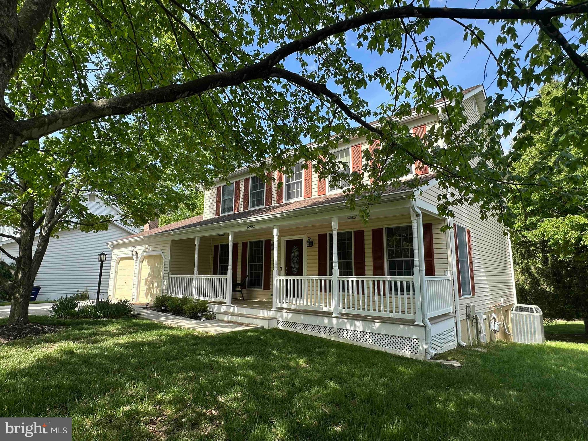 6902 Raven Lane Columbia, MD 21044 - Photo 2 of 47 a view of a house with a yard and sitting area