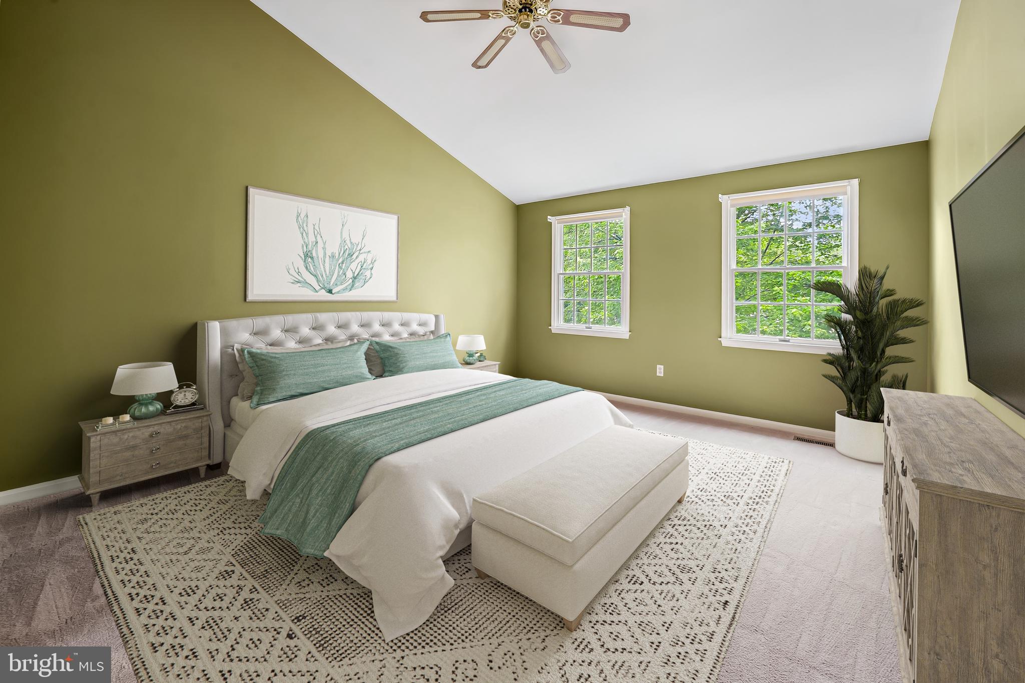 6902 Raven Lane Columbia, MD 21044 - Photo 26 of 47 a bedroom with a bed and a chandelier