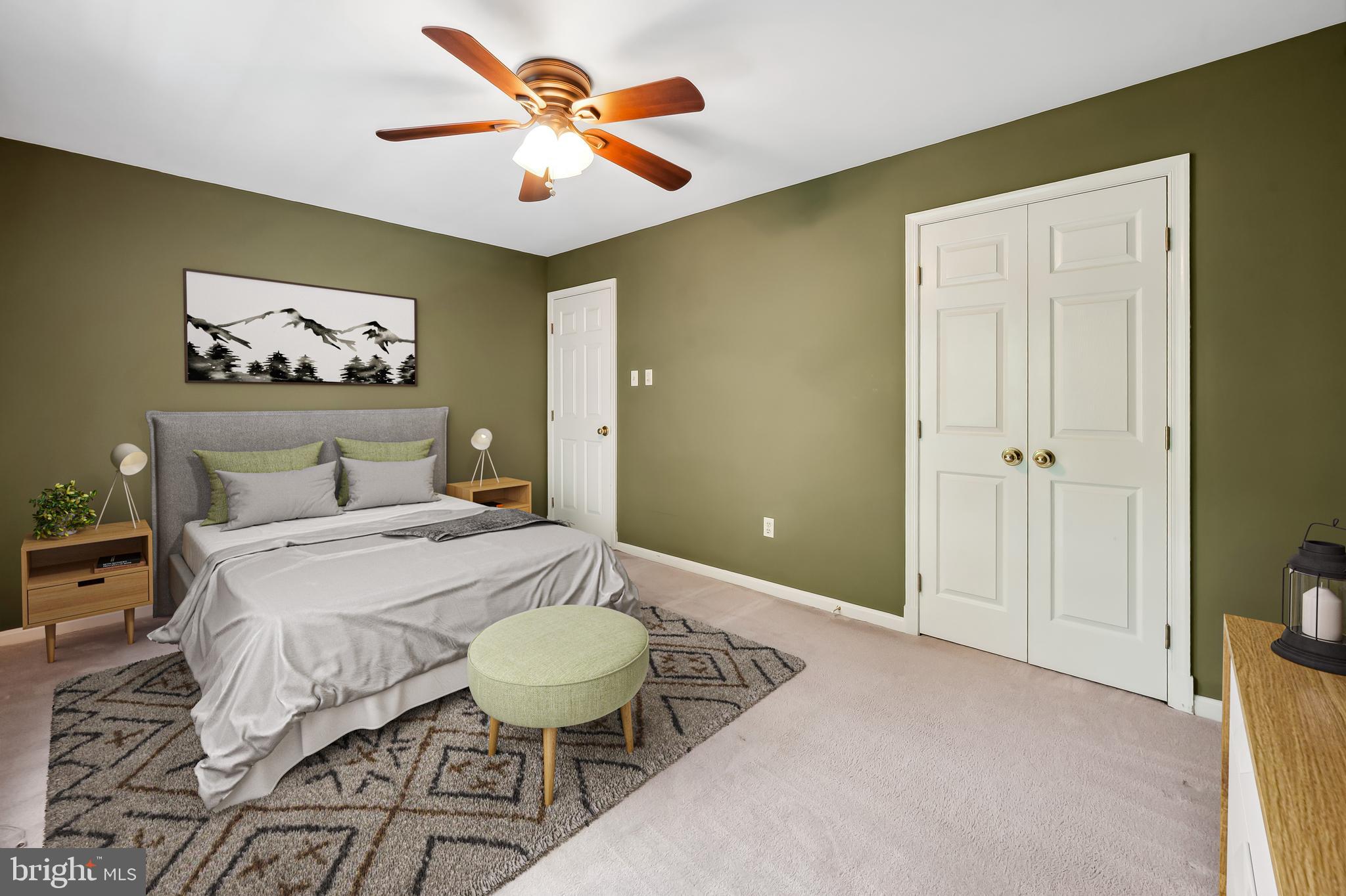 6902 Raven Lane Columbia, MD 21044 - Photo 30 of 47 a bedroom with a bed and a painting on the wall