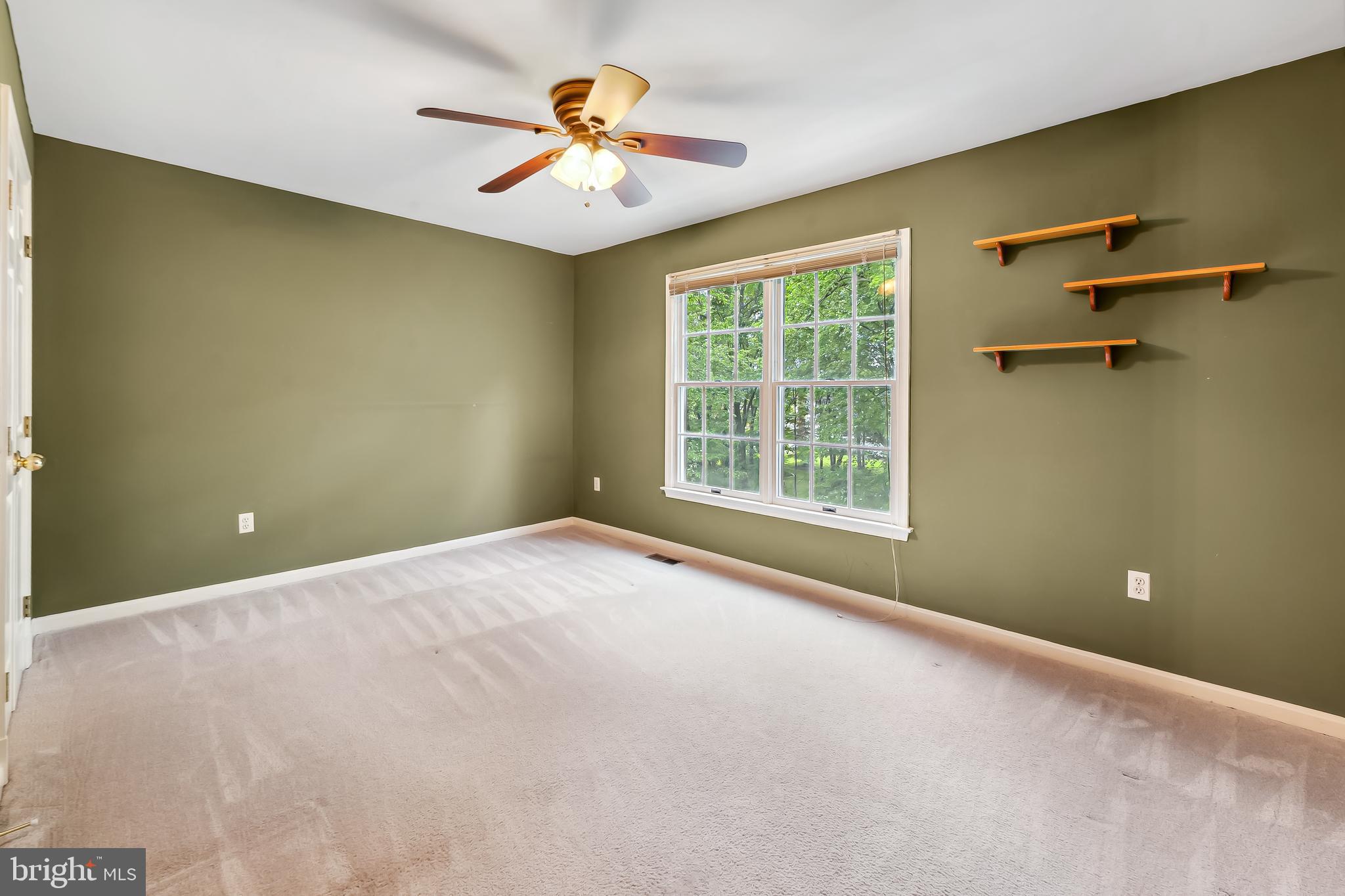 6902 Raven Lane Columbia, MD 21044 - Photo 31 of 47 a view of an empty room with a window
