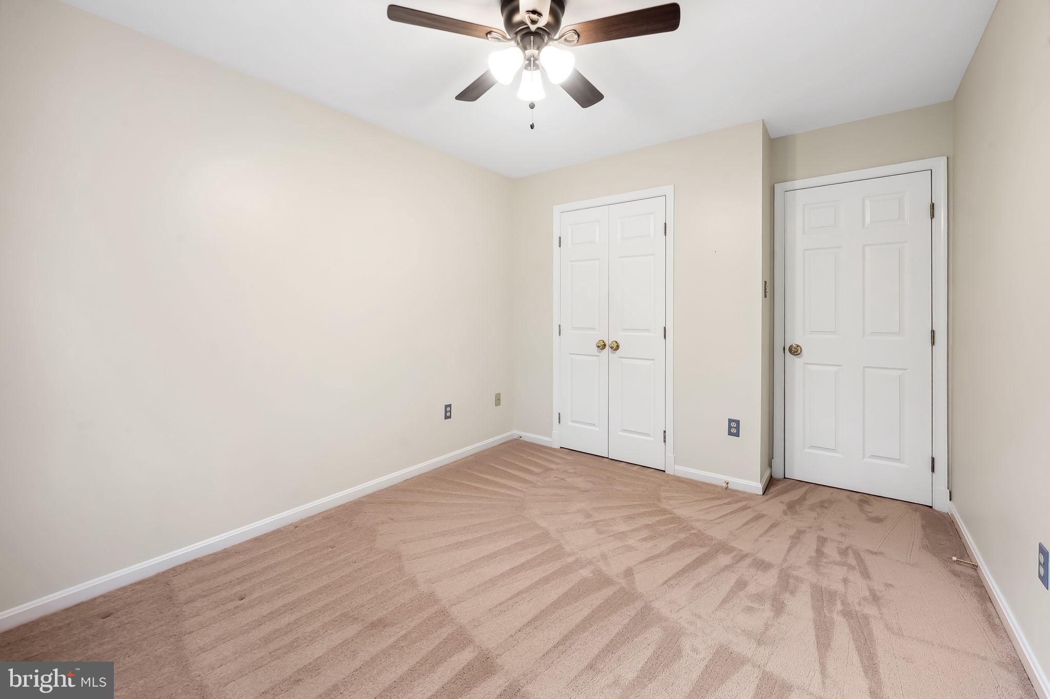 6902 Raven Lane Columbia, MD 21044 - Photo 34 of 47 wooden floor in an empty room