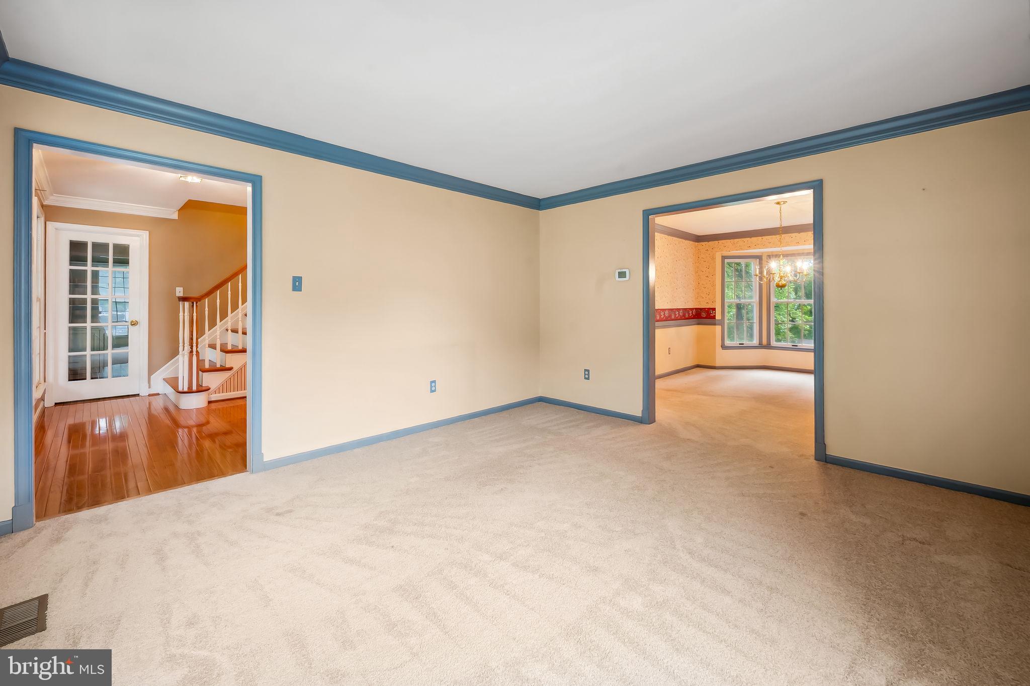6902 Raven Lane Columbia, MD 21044 - Photo 7 of 47 a view of an empty room with a window