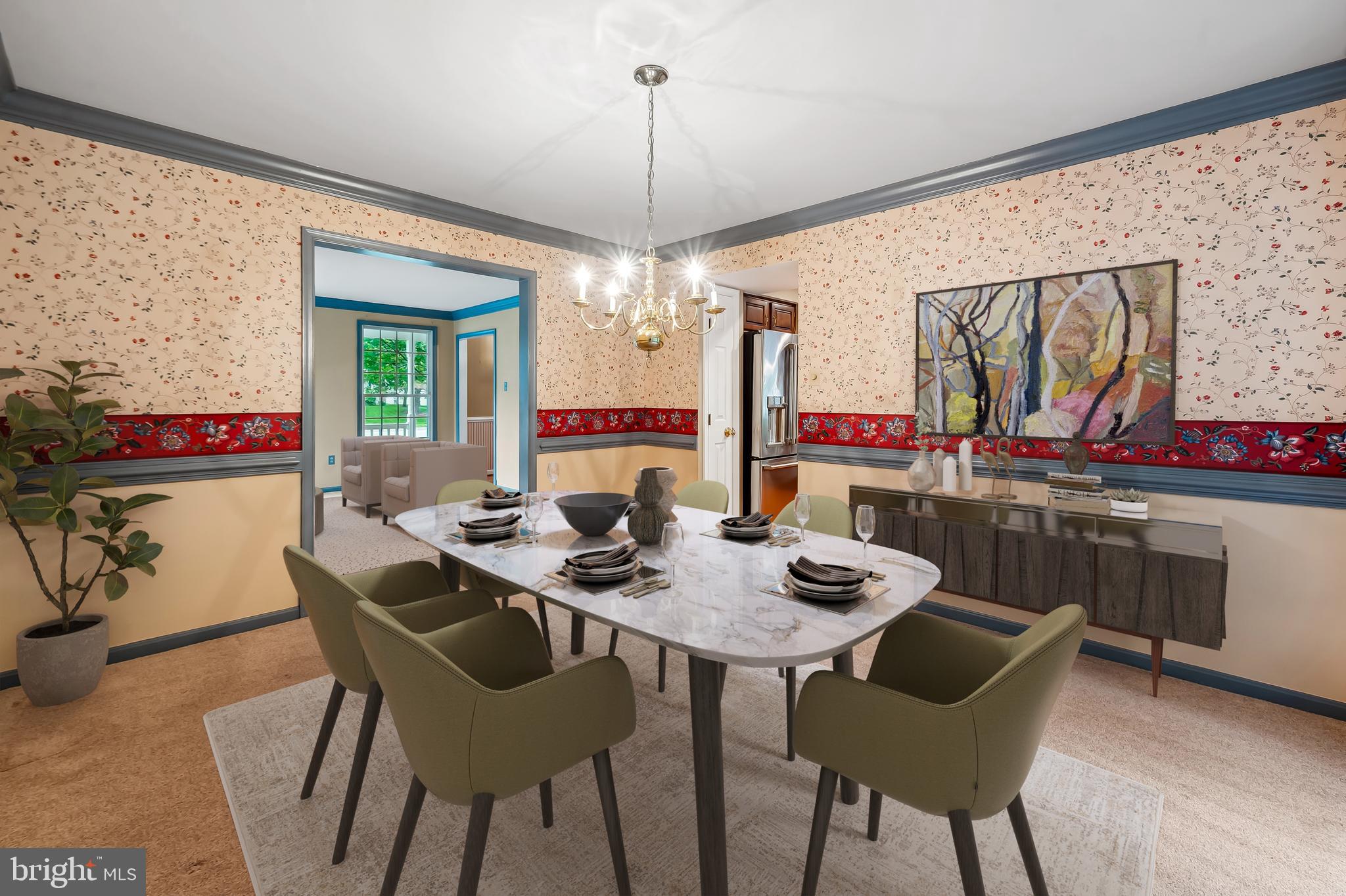 6902 Raven Lane Columbia, MD 21044 - Photo 8 of 47 a view of a dining room with furniture and a chandelier