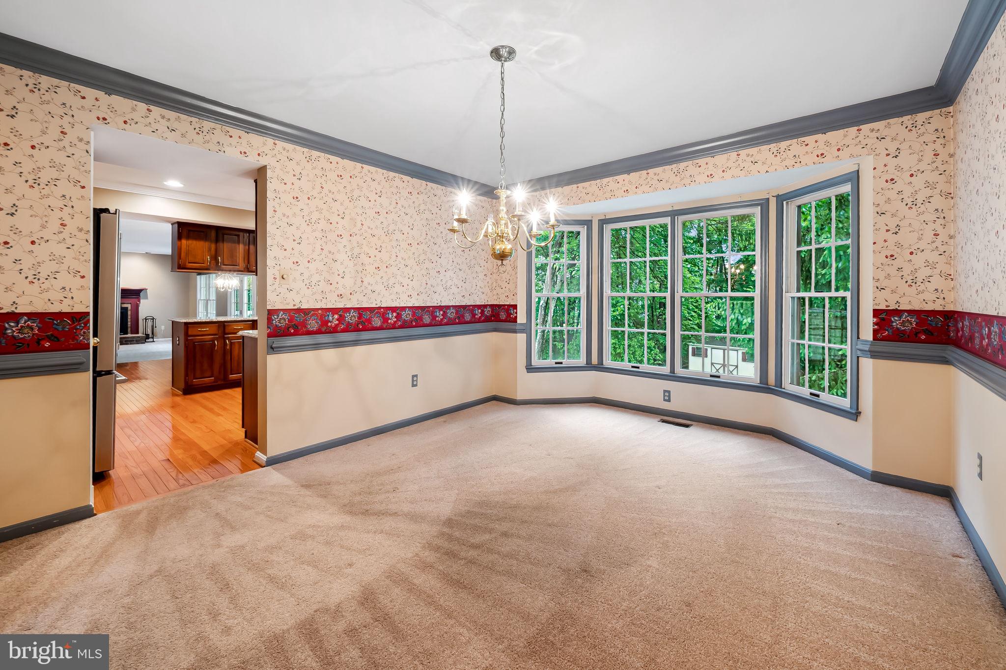 6902 Raven Lane Columbia, MD 21044 - Photo 9 of 47 a view of a room with furniture and window