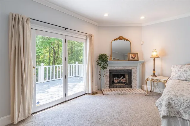 a view of an empty room with furniture