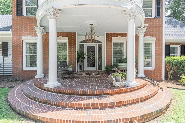 a view of a house with entrance gate