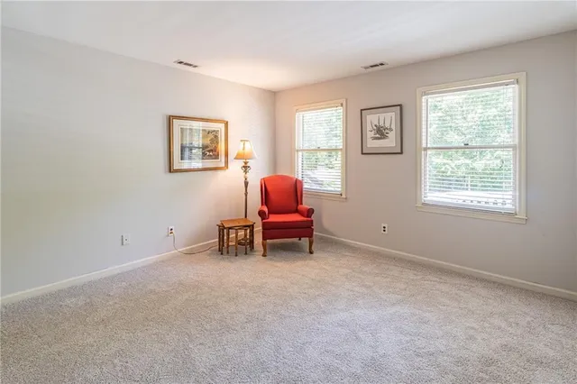 a backyard of a house with seating space
